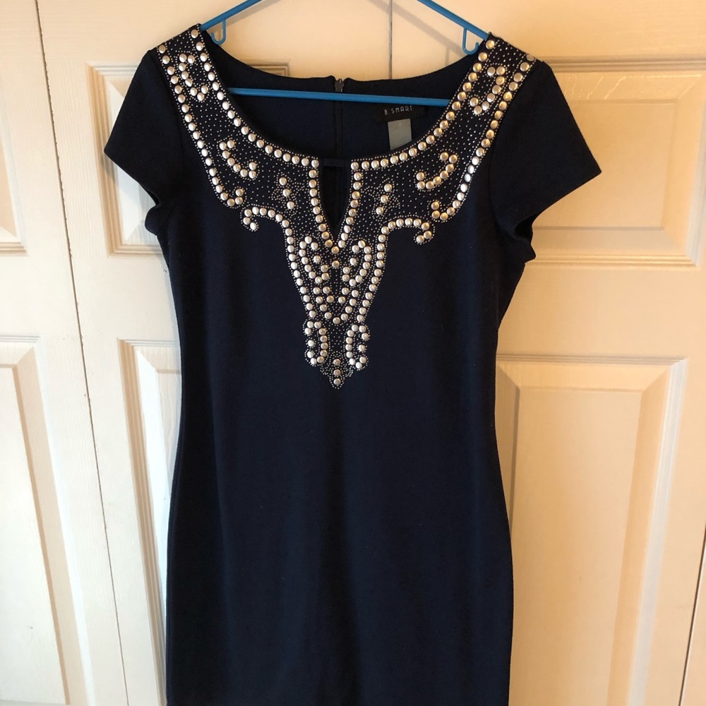 Navy blue dress with silver embellishments